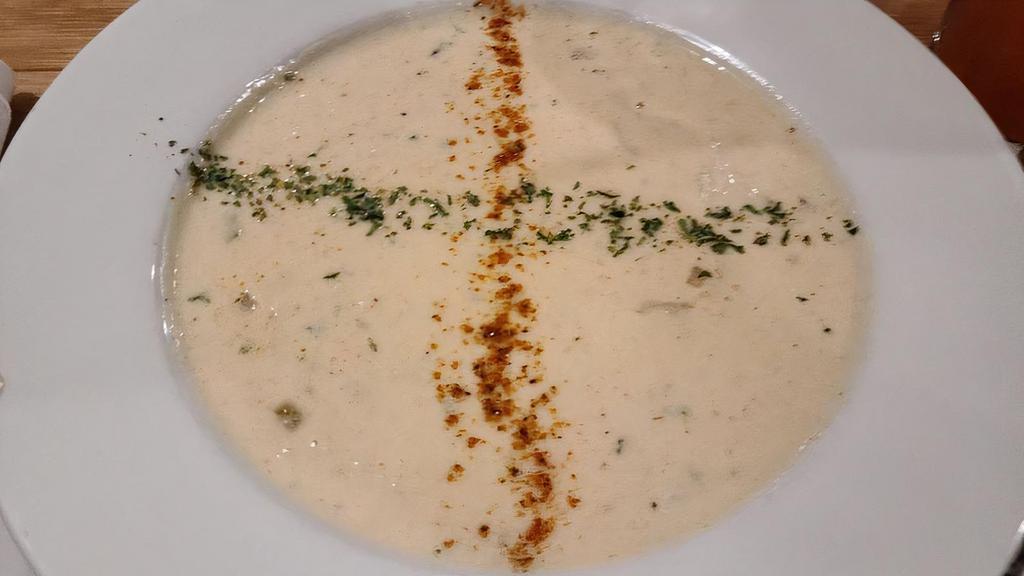 She Crab Soup · Classic she crab soup, lump crab meat, garnished with old bay and fresh parsley.