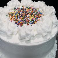 Vanilla Birthday Cake · Our signature vanilla cake topped with our house-made vanilla buttercream