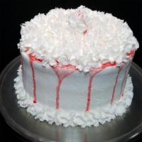 Strawberries And Cream Cake · Vanilla cake infused with strawberries, iced with vanilla buttercream, and topped with a str...