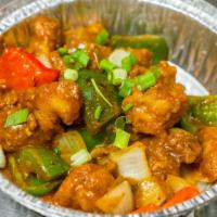 Chili Chicken · Boneless chicken, bell peppers, onions, tomatoes and spices.