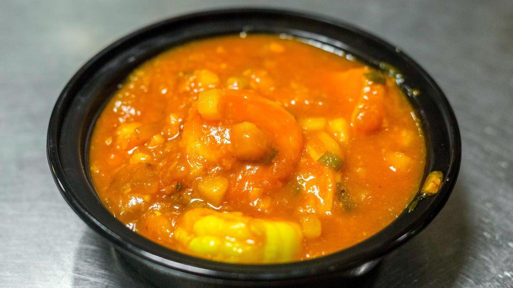 Tandoori Shrimp · Jumbo shrimp, herbs, freshly ground spices. Served with steamed aged white basmati rice.