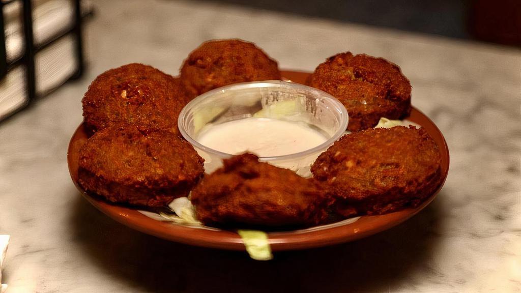 Falafel 5Pcs · Ground chickpeas, fava beans, garlic, onion, tahini and spieces.