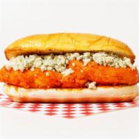 The Buffalo Chicken Sub · Crispy breaded chicken cutlet coated in buffalo sauce topped with blue cheese on a hoagie ro...