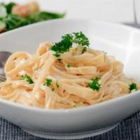 Fettuccini Alfredo · Rich and creamy alfredo sauce served at top customer's choice of marinated roasted chicken b...
