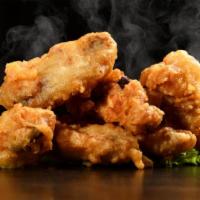 Plain Wings · Delicious wings sprinkled with special seasonings and baked to perfection. Served with custo...