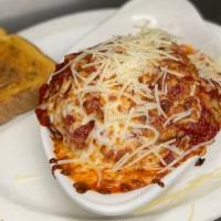 Baked Lasagna · Seasoned ground beef, layers of pasta, Parmesan, mozzarella, ricotta, and marinara sauce, th...