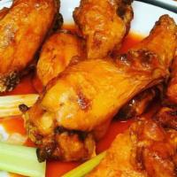 Buffalo Wings 8 Pieces · Hot, mild, BBQ, spicy honey, served with ranch or blue cheese dressing.