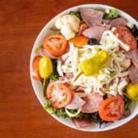 Antipasto Salad  · Spring mix topped with  Giardinera (pickled veggies), Ham, Salami, Cheese, tomatoes, green &...