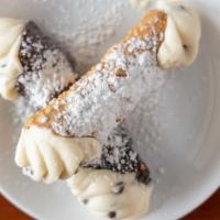Traditional Cannoli · A favorite Italian dessert!  Our traditional shell stuffed with Sweet Ricotta cheese and cho...