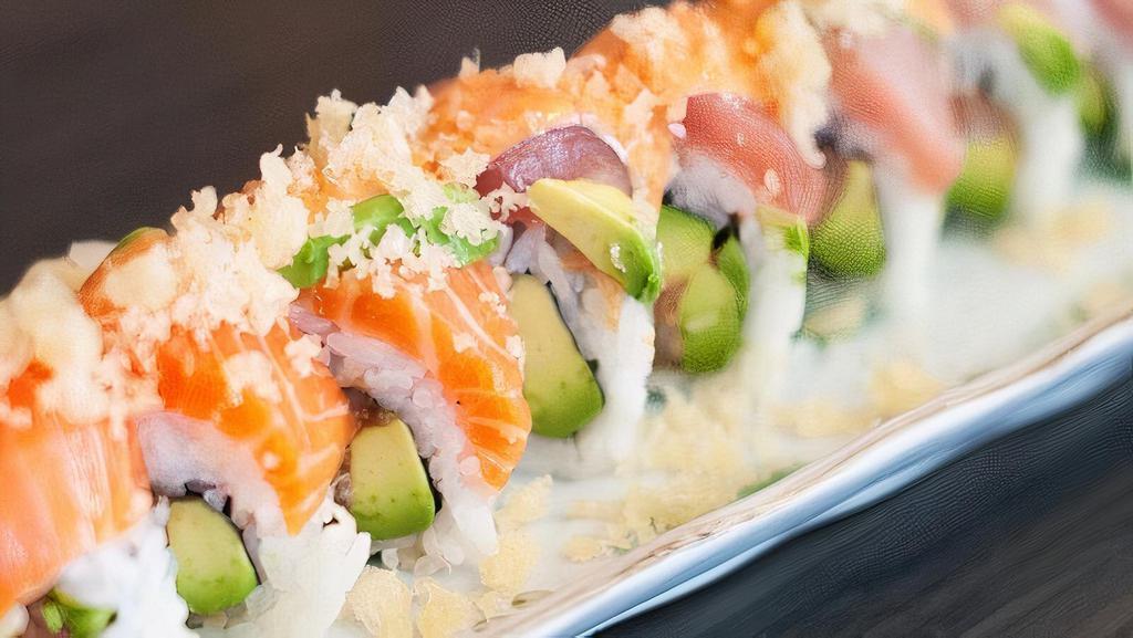 Beauty And The Beast Rolls · Crab avocado and cream cheese topped with eel tuna and eel sauce.