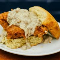 East Nasty · Buttermilk Biscuit Topped with Fried Boneless Chicken Thigh, Aged Cheddar and Sausage Gravy....