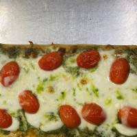 Caprese Flatbread Pizza · Fresh mozzarella, pesto, grape tomatoes,
provolone and mozzarella cheese