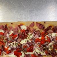 Italian Flatbread Pizza · Genoa salami, pepper ham, capicolla ham,
fresh mozzarella, red onion, roaster red
peppers, o...