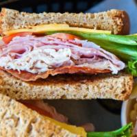 Chief'S (Not Chef'S) Club · Turkey, ham, bacon, American cheese, lettuce, tomato and mayo, served on your choice of bread.