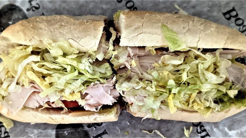 Southwest Club · Turkey, bacon, pepper jack cheese, avocado, lettuce, tomato and chipotle aioli, served a crusty sub roll.