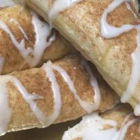 Cinnamon Breadsticks · Hand-stretched dough topped with butter, cinnamon sugar and icing.