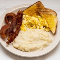 Economy Plus · Grits, two eggs, choice of bacon, pork links, hot sausage patty, ham or turkey and toast.