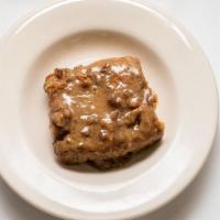 Bread Pudding · Topped w/ rum flavored pecan sauce