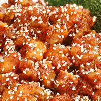 Sesame Chicken · Tender chunky chicken meat, marinated fried till crispy served with sesame sauce.