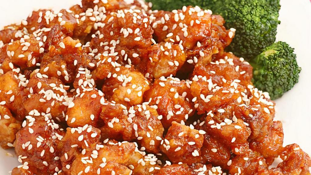 Sesame Chicken · Tender chunky chicken meat, marinated fried till crispy served with sesame sauce.