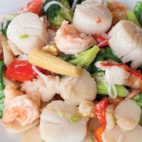 Seafood Delight · Lobster Chunks, Jumbo Shrimp, Scallop, Sauteed with Bamboo Shoots, Snow Peas, and Chinese Ve...