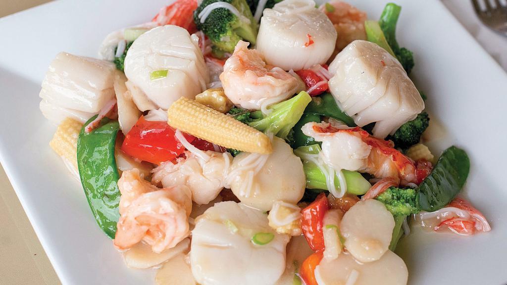Seafood Delight · Lobster Chunks, Jumbo Shrimp, Scallop, Sauteed with Bamboo Shoots, Snow Peas, and Chinese Vegetables
