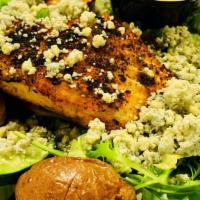 Salmon Salad W/ Spring Greens · fresh greens topped with baked salmon, parmesan, croutons and berries; served w/ side of lem...
