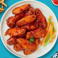 Flamin' Hot Wings · Classic bone-in wings oven-baked, cooked to order perfectly crisp, tossed in our house made ...