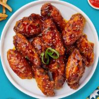 Mild Wild Wings · Classic bone-in wings oven-baked, cooked to order perfectly crisp, tossed in our house made ...