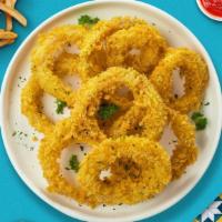 Golden Rings · Onions dipped in a light batter and fried to perfection