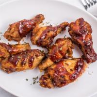 10-Piece Chicken Wings · Comes with a slice of watermelon. Cup of ranch available upon request. Please specify in spe...