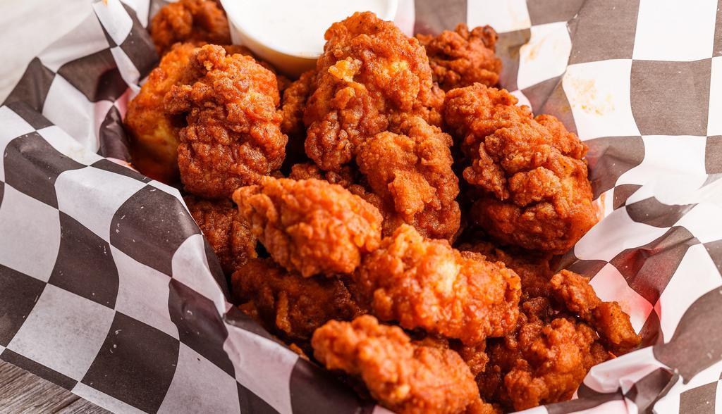 Chicken Bites · Perfect size bites of white meat, breaded and tossed in your choice of sauce. Buffalo, bbq, golden bbq, mango habanero, teriyaki, garlic parmesan or chipotle.