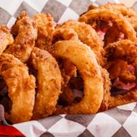 Onion Rings · Battered rings, lightly fried served with homemade comeback sauce.