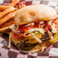 American · The classic american burger served on a sweet sourdough bun with American cheese, lettuce, o...