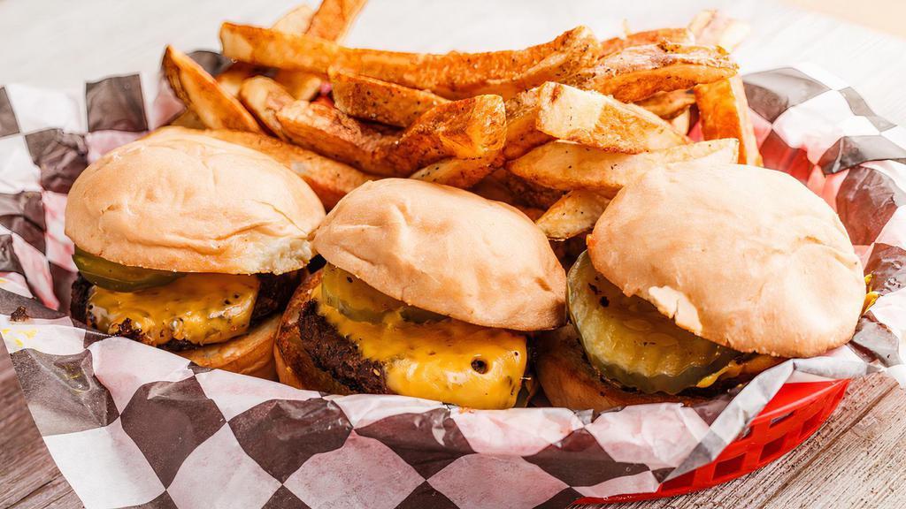 Hamburger Sliders · Three handcrafted burger bites, with American cheese, grilled onions, pickles and mustard on a slider roll. Served with french fries.