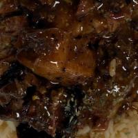 Bbq Beef Brisket Tips Rice Bowl · Beef brisket tips simmered in a savory homemade BBQ sauce and served over rice.