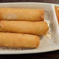 A-1. Crispy Spring Roll · Glass noodles and vegetables stuffed in a crispy shell served with carrot sauce.