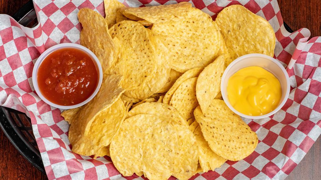 Chips, Cheese, Salsa · Crisp corn tortillas served with cheese dip & picante sauce.