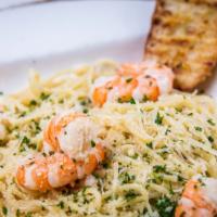 Shrimp Scampi · Angel hair pasta tossed with garlic butter/wine sauce.