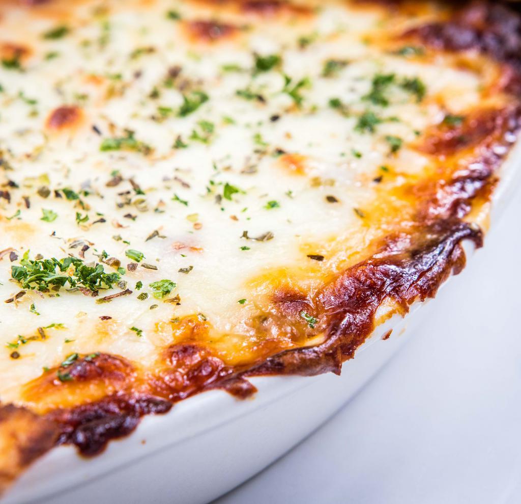 Bella Beef Lasagna · Homemade lasagna filled with premium Angus beef & layered with ricotta & Mozzarella cheese. Served with a side house salad.