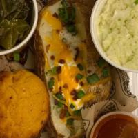 Bbq Plate · We’re known the world over for our pork, slow-smoked over Carolina oak. Includes 2 sides and...
