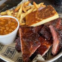 Spare Rib Plate · Slow-smoked for hours until they’re good and tender. Includes 2 sides and a choice of bread.