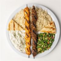 Rice Platter- · Rice, tabouli, tzatziki sauce, grilled pita and choice of meat. Choice of marinated chicken ...
