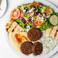 Falafel Veggie- · Fried Ground chickpeas with herbs, Fresh Greek Salad, Hummus, Tzatziki Sauce, Grilled Pita