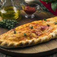 Italian Calzone · Juicy pepperoni, italian Sausage, parmesan & mozzarella.