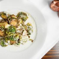 Vegan Brussel Sprouts · Tossed pepperjelly sauce.