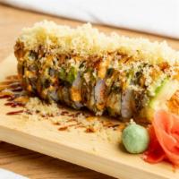 Monster Roll · Raw fish. Salmon, spicy crab, cream cheese rolled up and fried, top with avocado, spicy craw...