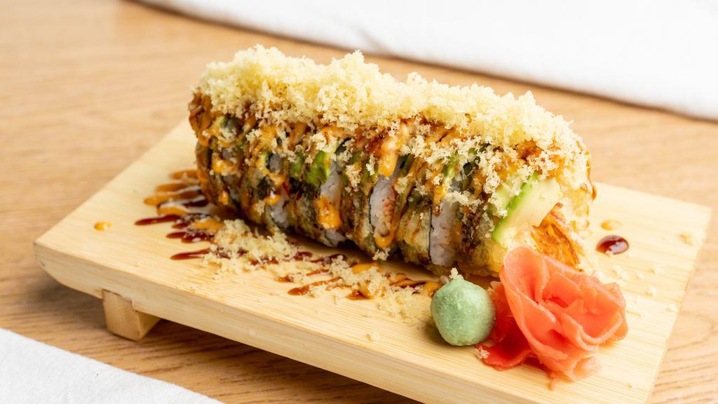 Monster Roll · Raw fish. Salmon, spicy crab, cream cheese rolled up and fried, top with avocado, spicy crawfish, eel sauce, spicy mayo and tempura flakes.