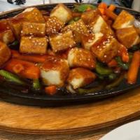Tofu · Served with white rice on a hot skillet with special teriyaki sauce additional charge for fr...