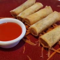 Spring Rolls (4 Pieces) · Deep fried. Crispy rolls stuffed with ground chicken, shrimp, glass noodles and vegetables s...